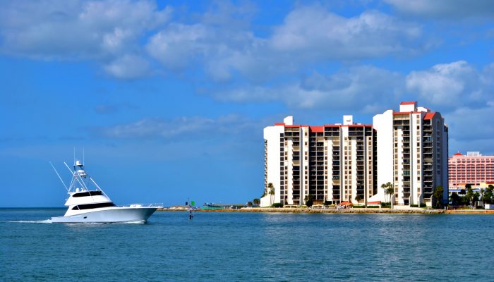 A yacht sailing along Sand Key coast in Florida